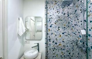 Modern 1BR with Orange Accents - 1