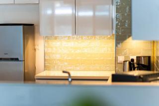 Luxury 2BR Golf View 85" TV Yas Bay - 3