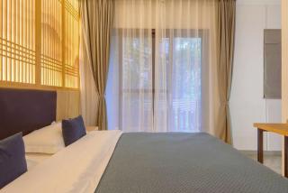 Heinemann Hotel Sunny King Room without Bathtub A308 with a jacuzzi and a local - 8