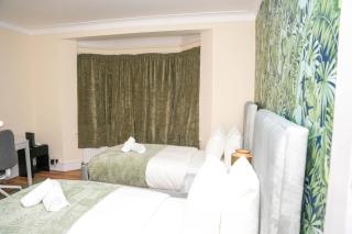 Spacious 4-Bed Home with Free Parking - 2