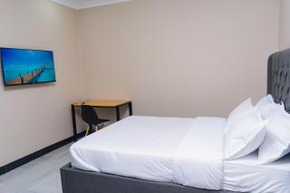 Palms & Pebbles Lodge - 8