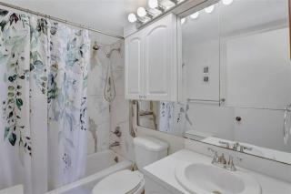 Coastal Two-Bedroom Condo with Balcony - 4