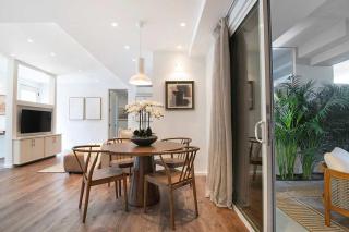 Modern 2BR Oasis with BBQ Sauna & Private Yard - 1