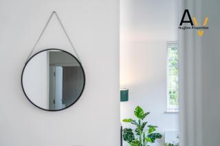 Executive Two-Bedroom Apartment - Central Location, Parking, Great for Business & Relocation by AV Hughes Properties - 1