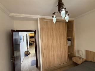 Modern appt with pool and easy access to beach - 1 Bedroom with spacious living room and sunroom overlooking pool and terrace - 1