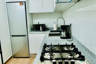 Stylish 1BR Condo Prime Location 4B - 7