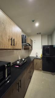 Stay Luxe Stylish 2BHK in Bahria Town Prime Location - 9