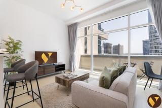 Vogue Vacation Homes, Business Bay - Bay Square close to Downtown Dubai Mall and Burj Khalifa, One Bedroom Apartment with Balcony and City view - 0