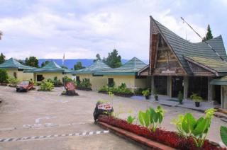 Danau Toba International Cottage - 1