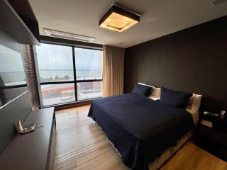 Vista para a baía com sofisticação - 2