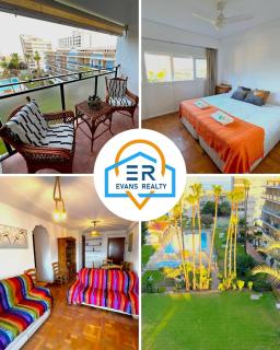 Evans Realty CB Balcón vistas al mar y piscina - 0