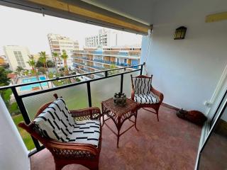 Evans Realty CB Balcón vistas al mar y piscina - 2