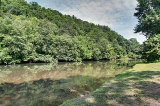 Astounding River View - Outdoor Hot Tub, Volleyball Net, Game Room + More! - 1