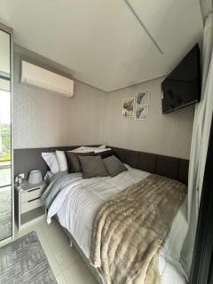 Varanda panorâmica | Suíte Comfort Batel - 0