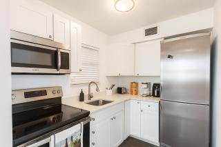 Oasis Waterfront Treasure Island Apartment with Patio Dock and Johns Pass - 4