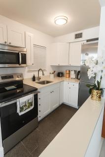 Oasis Waterfront Treasure Island Apartment with Patio Dock and Johns Pass - 3