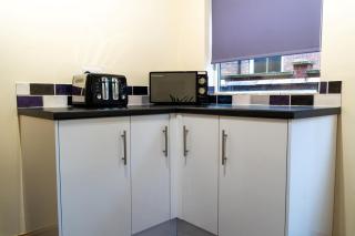 LuxeVille I Serene 3BR Apartment with Private Courtyard I LongTerm RatesI ParkingI WiFi - 3