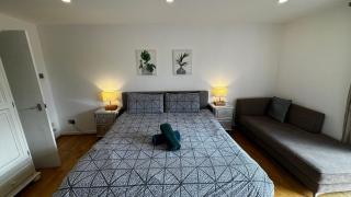 En-suite room with a superking size bed and balcony - 4