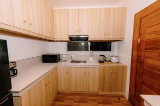 Modernong Bahay Kubo na may gitnang mainit at malamig na shower - 3