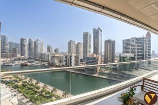 Vogue Vacation Homes, Marina Dorra Bay near JBR Beach and Ain Dubai, Two Bedroom apartment with Balcony, Canal and Skyline View, Access to all Amenities - 0