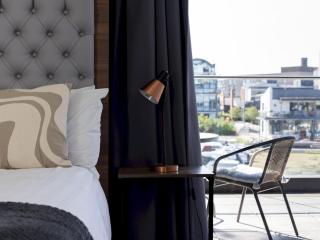 Chic Riverside View with Balcony Pass The Keys - 9