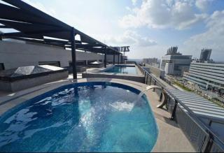 Zeta Mall Condo Pool above Mall below - 1