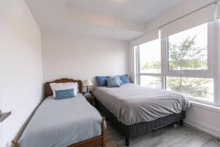 Modern 2BR Getaway with Balcony, BBQ and Parking - 7