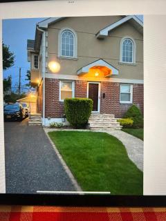 Charming 2 Bedroom One Block from UBS Arena! - 0