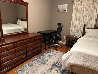 Charming 2 Bedroom One Block from UBS Arena! - 1