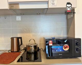 Staycation Homestay 77 D'Millenia near UNIMAS - 1