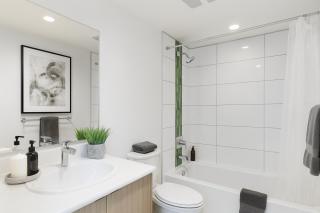 Cozy 2BR Retreat Steps to Waterfront Station - 3