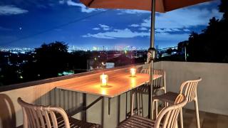 Cozy Nest Fully-furnished apartment with Manila Skyline View Rooftop - 1
