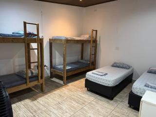 QUARTOS Praia do Tombo Guarujá - 4