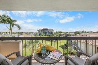 Condo with view of Clam Bay and pool/beach access - 0