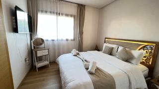 mini-villa situee dans une residence Prestigia à Marrakech, avec une vue sur la piscine et le golf une securite 24h sur 24 et une proximite ideale de l aeroport 5 minutes C est une offre parfaite pour des vacances - 8