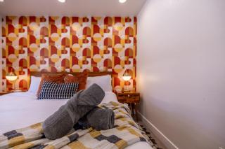 Colorful Comfort with Hot Tub, Retro Arcade, & Fire Pit! - 5