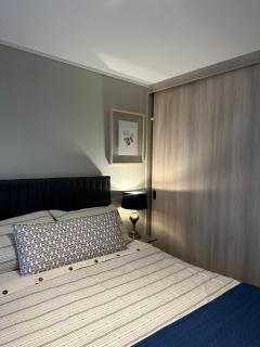 Estilo mariposa Central en distrito Icono - 0