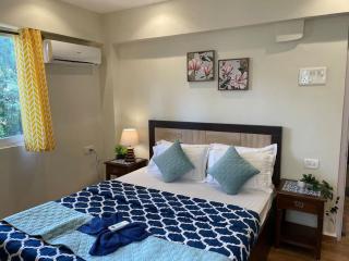 Serenity & Oceans New 1BHK Luxury Large Apt Pool, Kitchen, 2 Balconies - 1