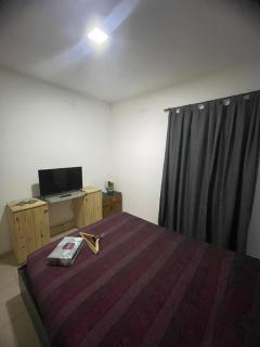 Departamento frente al shopping con patio - 7