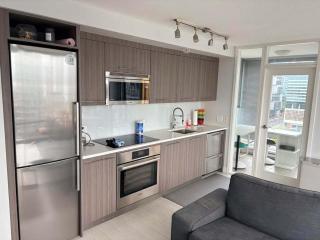 Family-Friendly 2BR Apartment in Vibrant East Vancouver - 3