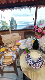 Apartamento com churrasqueira, ar condicionado e vista para o mar localização espetacular - 0