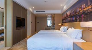 Sky World Hotel Qingdao - 9