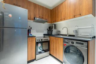 Elegant 2BR Apartment Mirage Zen Masdar City - 8