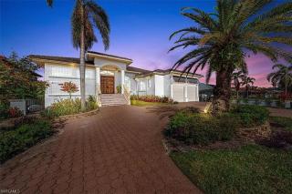 Waterfront Retreat! Breathtaking Water Views - Sparkling Pool & Dock - Walk to the Beach! - 9