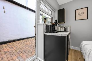 Compact Studio Nook Modern, Warm, Inviting - 0