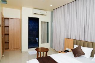 Atithi Deluxe Rooms - 6