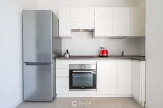 Modern & Bright 2BR Retreat with Balcony - 8