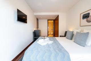 Premium Flat w/ Pool, Gym & Garage by HostWise - 1