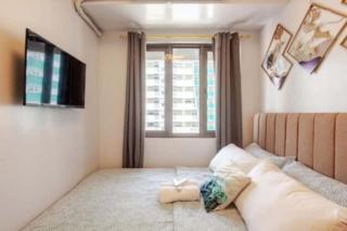 Staycation hosted by Cozypura near MOA, Airport, with Netflix and FREE WIFI with pay parking - 1