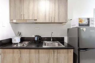 Staycation hosted by Cozypura near MOA, Airport, with Netflix and FREE WIFI with pay parking - 3